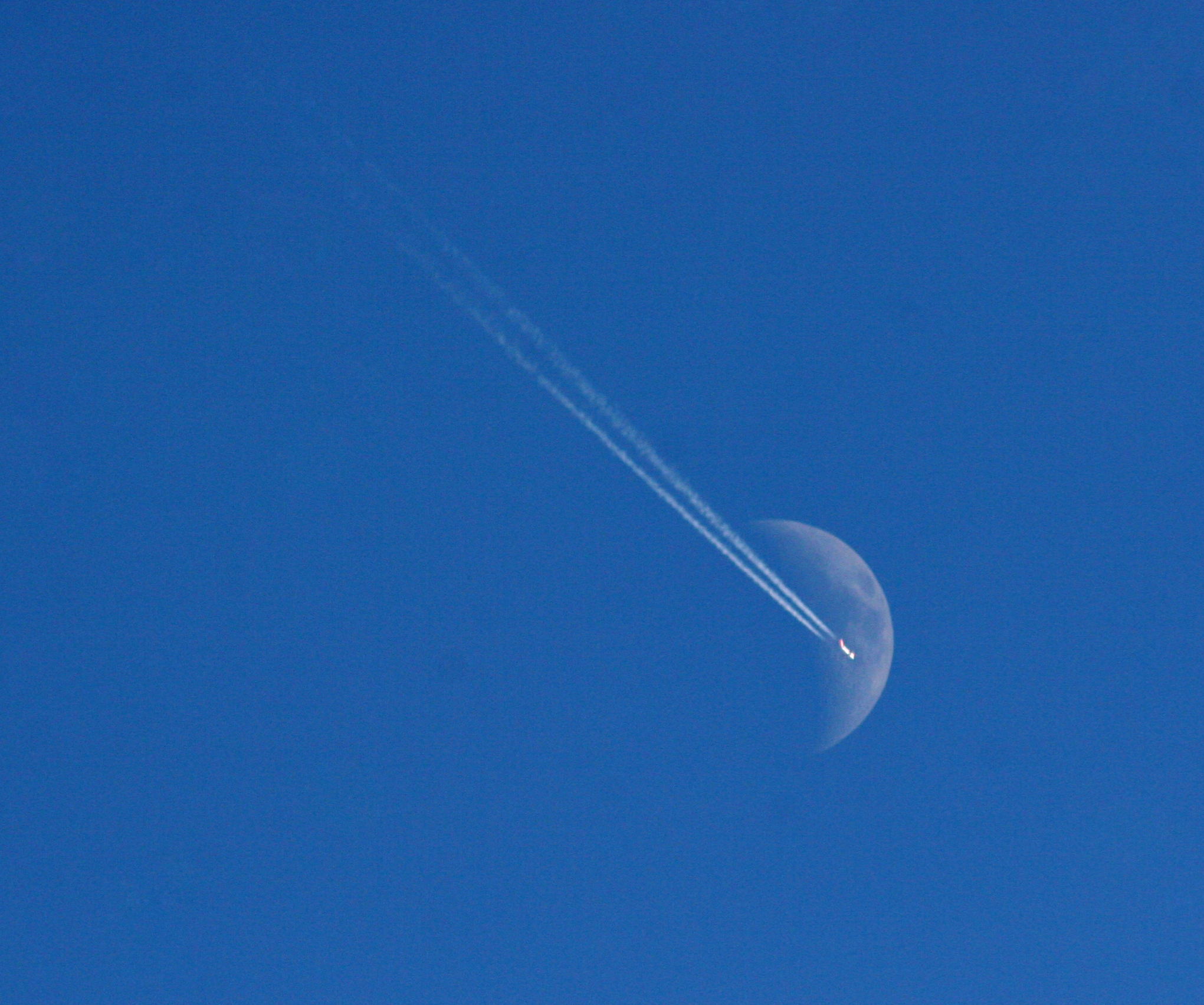 Moon with plane