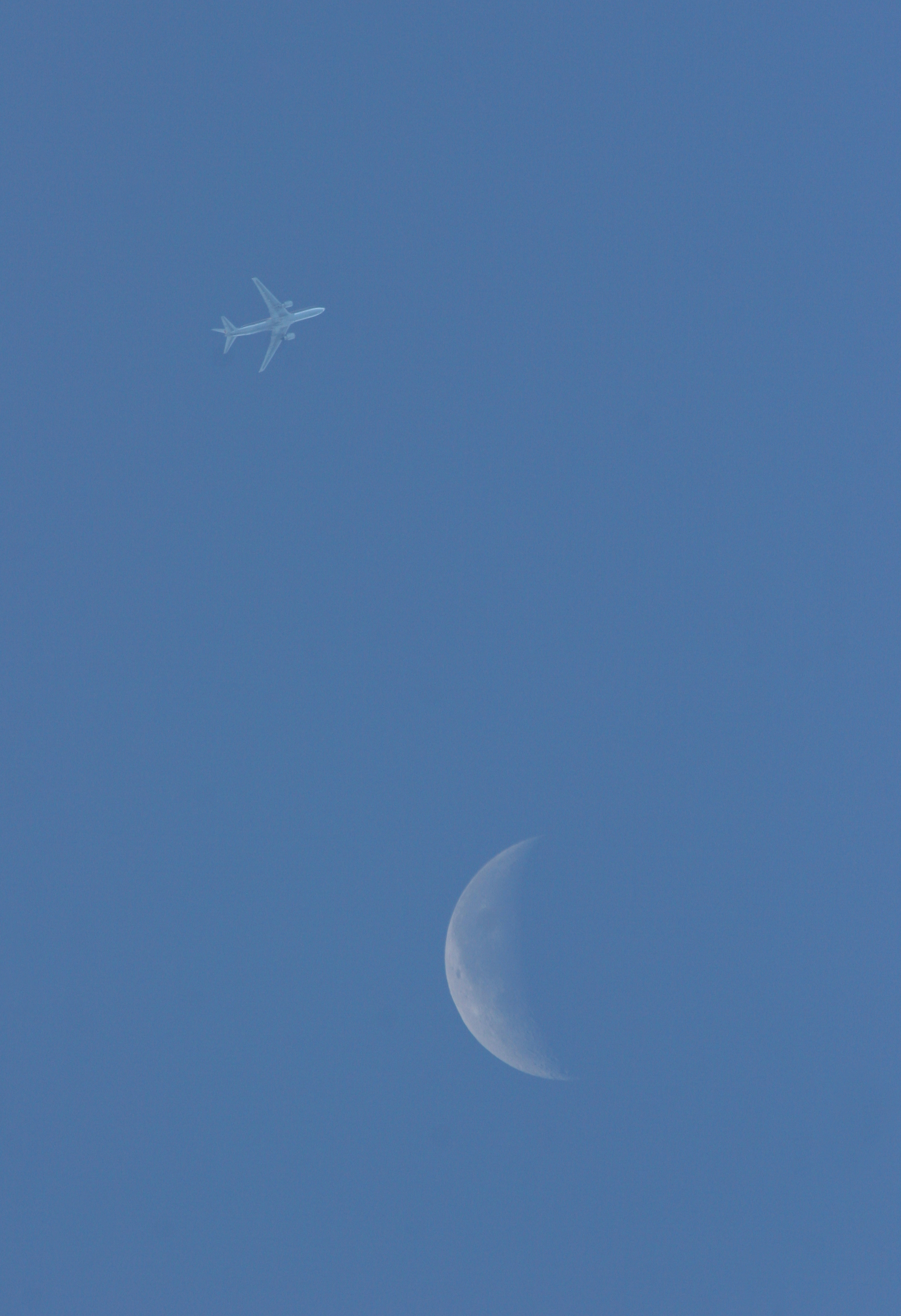 Moon with plane