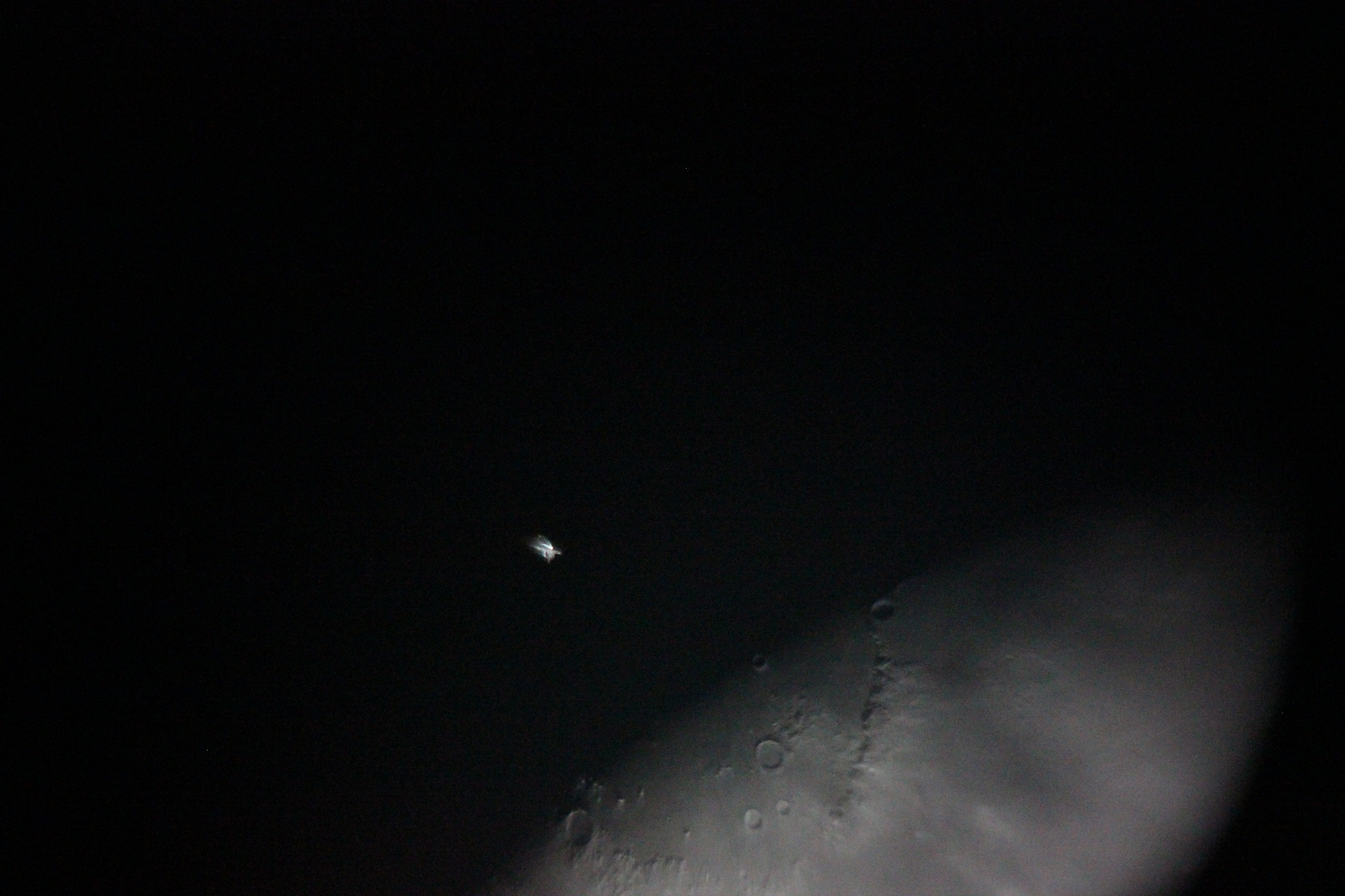ISS Crossing Moon